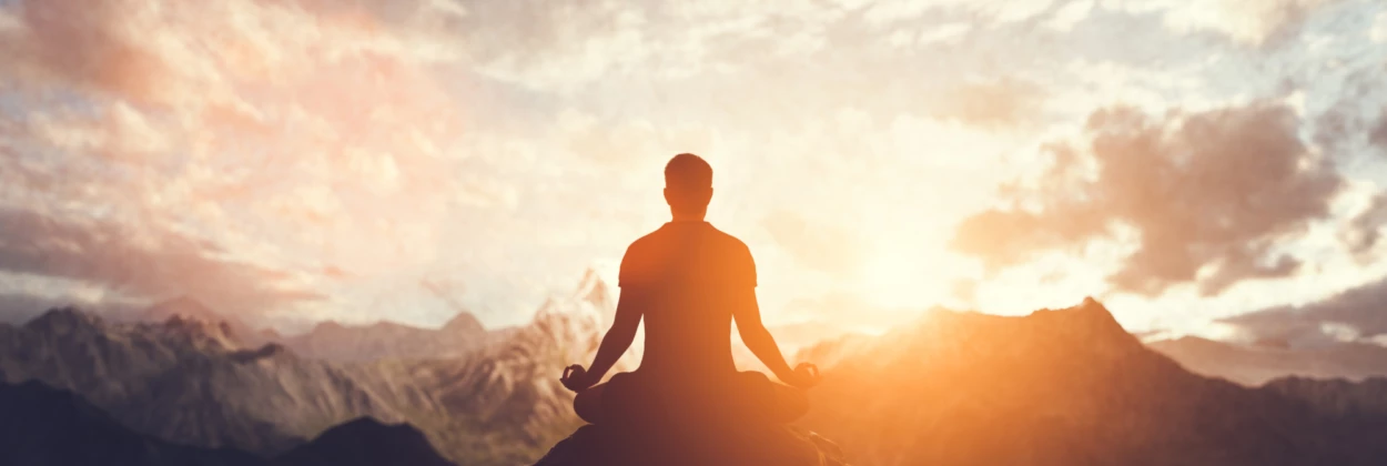 Man in yoga pose zen meditation at sunset 2022 10 24 21 57 48 utc